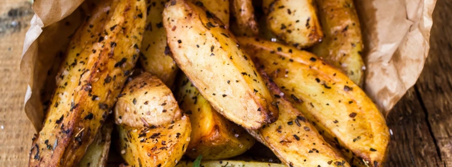 a pile of cooked potatoes with spices